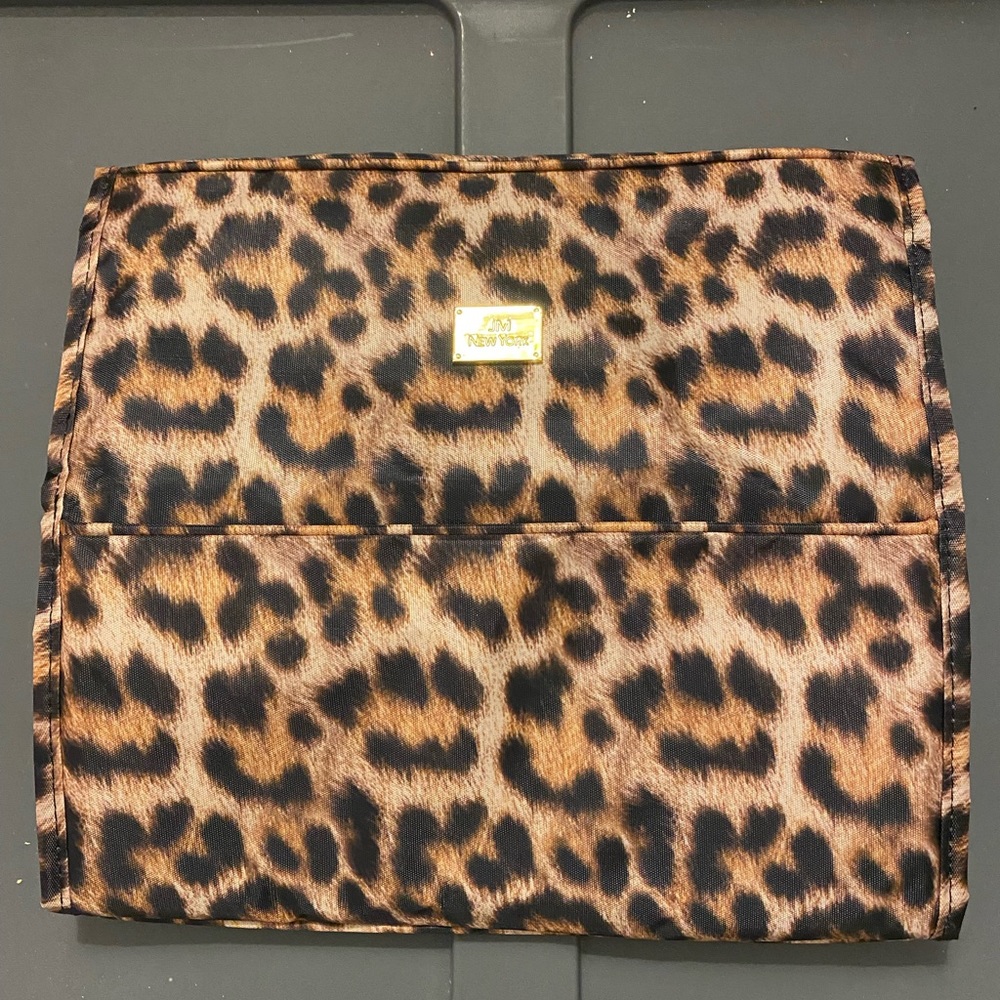 JM New York travel makeup bag.